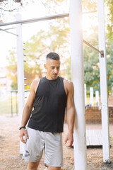 Portrait, man outdoor for exercise with runner in nature for cardio, health and wellness. Fitness, workout and run on a misty morning in park, training for marathon or race with confidence