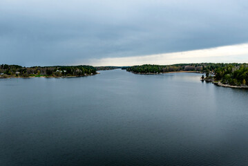 Fototapeta premium Sunset at Stockholm Archipelago. The archipelago extends from Stockholm 60 kilometres (37 miles) to the Baltic Sea at east