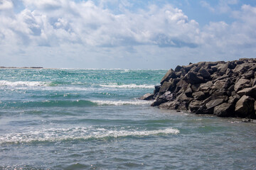 Arichal Munai (near Dhanushkodi) is the southern tip of Rameswaram Island in Tamil Nadu, India, It is a unique geographical point where the Bay of Bengal and the Indian Ocean converge