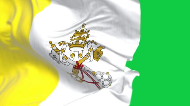 Close-up of Vatican City flag waving isolated on green background