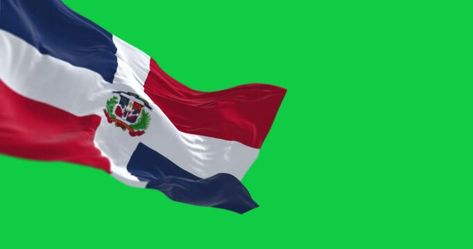 Dominican Republic national flag waving isolated on green background