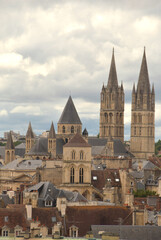 Obraz premium Caen is a beautiful French city in Calvados in Normandy. It has important squares and monuments such as St. Stephen's Abbey and St. Peter's Church.