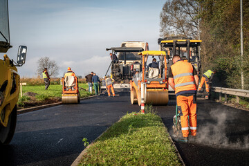 Complete Asphalt Laying Process with Paver, Compact Roller, Handheld Compactors, and Construction Workers