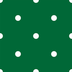 White polka dot on green seamless pattern