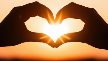 Obraz premium Hands in heart shape with sun rise background, love concept