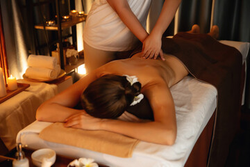 Caucasian woman customer enjoying relaxing anti-stress spa massage and pampering with beauty skin...