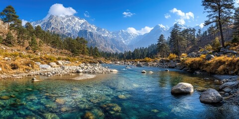 Majestic mountain river flowing through a lush valley in the himalayas © Lubos Chlubny