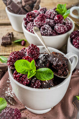 Chocolate mug cake with blackberry