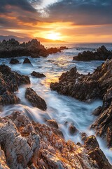 Obraz premium Impressive coastal view of rocky shore at sunset, highlighting nature's artistry.