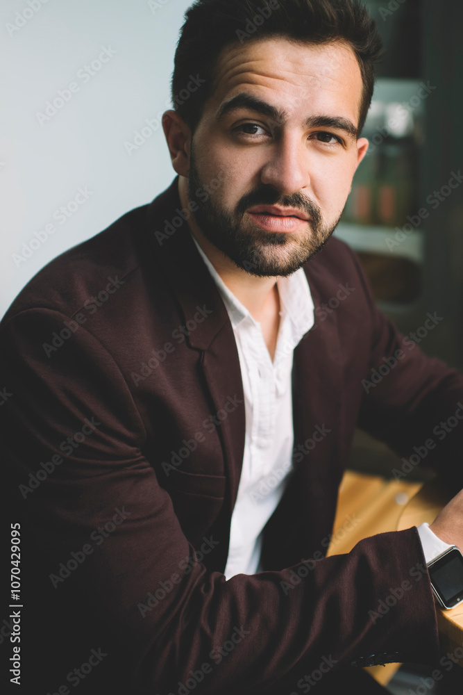 Poster portrait of handsome caucasian man in formal outfit holding mobile phone sending text message using 