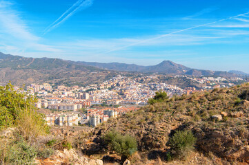 Fototapeta premium Hiking to Monte Coronado at sunny day, Malaga, Costa del sol, Andalusia, Spain. View of Malaga from the mountain.