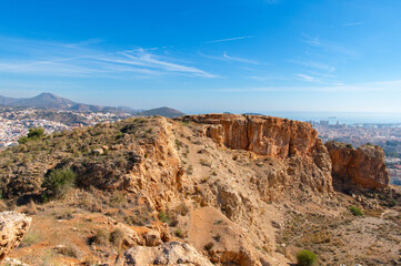 Hiking to Monte Coronado at sunny day, Malaga, Costa del sol, Andalusia, Spain. View of Malaga from the mountain.