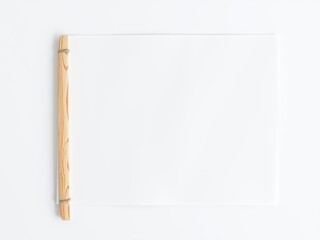 A blank white paper sheet attached to a wooden stick against a soft blur background, mockup, craft