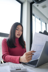 Beautiful confident asian business woman working with laptop Hands typing keyboard. Professional investor working new start up project. business planning in office. Technology business.