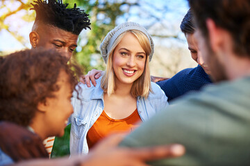 Friends, group and huddle for diversity, happy and bonding with team building, community and...