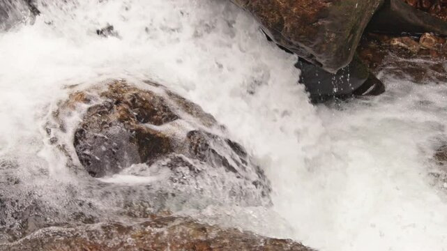 Closeup slow motion shot of a rapid in Paine Creek in the Laurel Snow State Natural Area, Dayton, Tennessee
