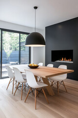 Modern dining room with a sleek wooden table and minimalist decor in a stylish home