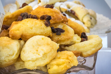 Fresh prepared fried dumplings on frying pan. Traditional polish food