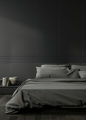A minimalist bedroom with a black wall. a white bed with grey bedding. a black lamp. and a side table