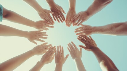 A circle of diverse hands reaching toward the sky, symbolizing unity and collaboration.