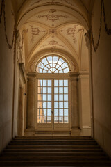 Obraz premium Ancient dark staircase - Grunge interior, nobody, empty building architecture, window.