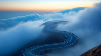 a winding mountain road ou the clouds