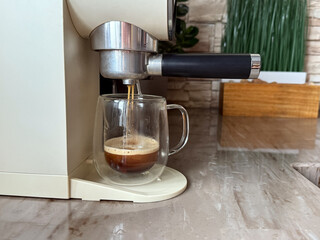 A man making coffee at home