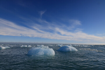 Iceberg drifting in the sea in front of the Austofonna Ice Cap