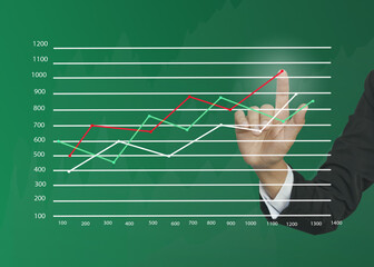 Hand touching growth graphs of financial indicator and accounting market economy analysis chart,...