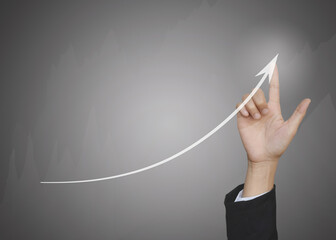 Hand touching growth graphs of financial indicator and accounting market economy analysis chart, business strategy concept.