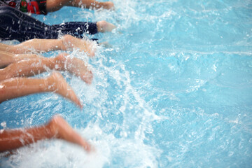 Splashing Feet in a Pool Setting