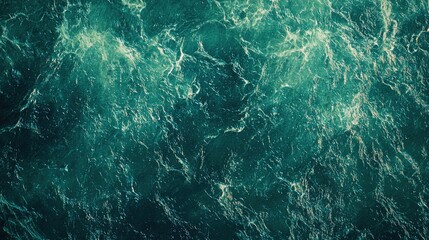 Obraz premium Closeup view of turquoise ocean water with white foam.