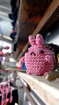 Pink doll amigurumi,Molang crochet keychain in the corner of hat rack