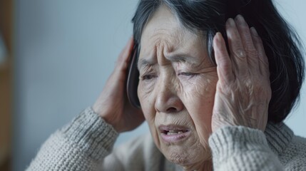 Fototapeta premium Mature woman experiencing mental health challenges such as depression or anxiety at home, dealing with feelings of worry, sadness, and emotional grief