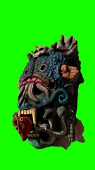 painted tiki mask with green background