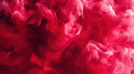 Abstract red smoke swirling elegantly in a mesmerizing display of movement and color.