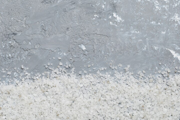Background from white sea salt. Coarse rock salt texture witth copy space