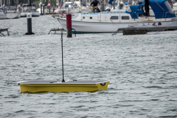Solar powered remote controlled boat monitoring The River Hamble Hampshire England