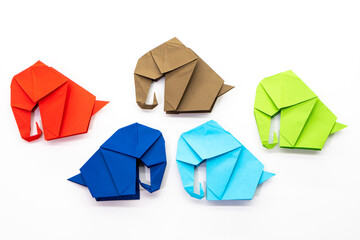 Paper elephant on white background. Origami elephant. Nature concept
