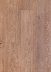 Fototapeta premium wooden floor covering in brown color. a close-up photo of the texture