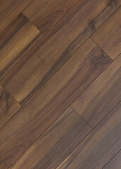 wooden floor covering in brown color. a close-up photo of the texture