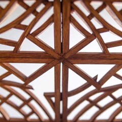 Close-Up Geometric Shapes on White Background: A close-up image featuring various geometric shapes on a white background, using deep focus to highlight the texture and arrangement of each shape.