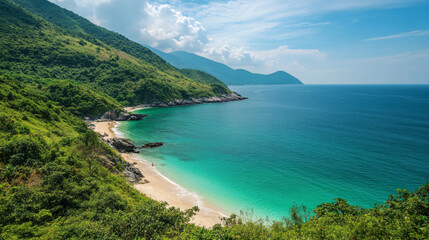 Fototapeta premium A secluded beach in Vietnam with crystal-clear waters, white sand, and lush green hillsides framing the serene coastline