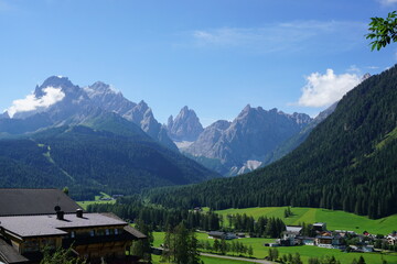 view of a mountain village during a summer trip in a sunny day 