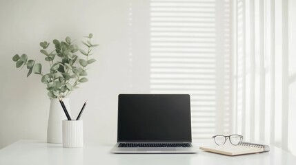 Fototapeta premium Minimalist Workspace with Laptop and Notebook