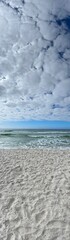 Vertical panorama picture on the beach of Panama City Beach on a beautiful day