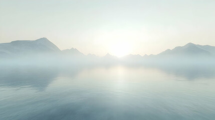 Fototapeta premium Misty mountain sunrise reflected in a still lake.