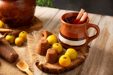 Mexican Christmas fruit punch. In Mexico it's called Ponche, is a hot fruit-infused drink, traditionally consumed in the December season during posadas party and Christmas Eve.