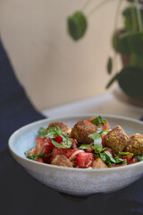 Fresh salad with falafel and cheese