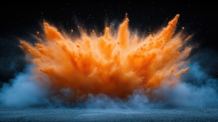 Orange powder explosion with smoke against a black background.